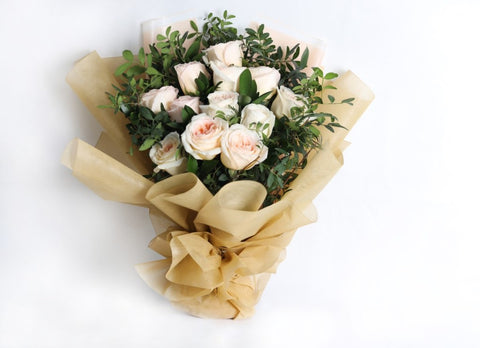 Rose bouquets and hand bouquets - Naseem Flowers